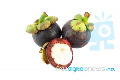 Half Opened Mangosteen And Two Whole On White Background Stock Photo