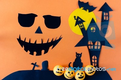 Halloween Concept With Black Eyes And Mouth On Orange Background… Stock Photo