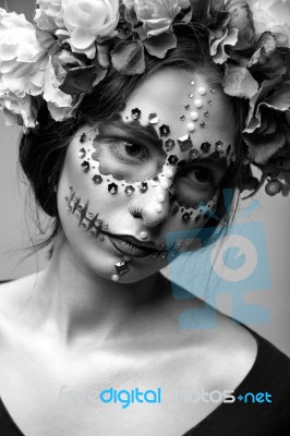 Halloween Fashion Model With Rhinestones And Wreath Of Flowers Stock Photo