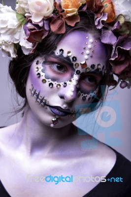 Halloween Fashion Model With Rhinestones And Wreath Of Flowers Stock Photo