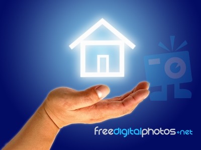 Hand And Icon House Stock Photo