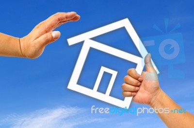 Hand And Icon House Stock Photo
