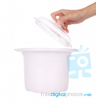 Hand Hold Glass Cover Of Ceramic Steam Pot On White Background Stock Photo