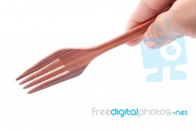 Hand Hold Wooden Fork Stock Photo