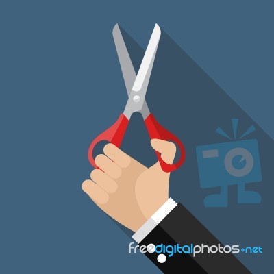 Hand Holding A Pair Of Scissors Stock Image