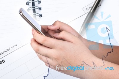 Hand Holding And Touch On Smartphone Stock Photo