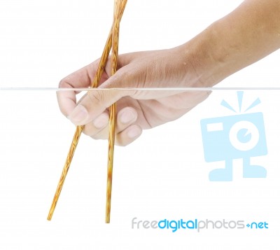 Hand Holding Chopstick Stock Photo