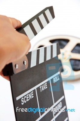 hand holding clapperboard Stock Photo