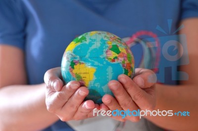 Hand Holding Globe Stock Photo