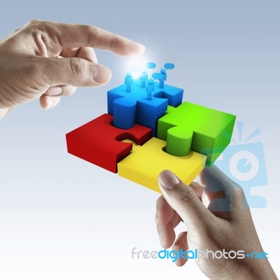 Hand Holding Jigsaw Puzzle Stock Image