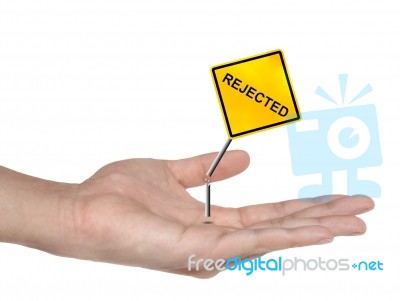 Hand Holding Rejected Sign Stock Photo