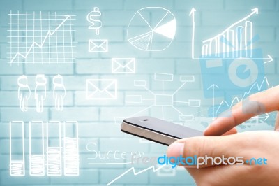 Hand Holding Smart Phone With Drawing Business Plan Concept Stock Photo