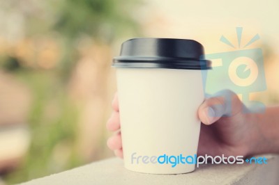 Hand Holding Take Away Coffee Cup Stock Photo