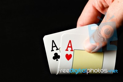 Hand Holding Two Aces Stock Photo