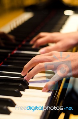 Hand Of A Piano Player Stock Photo