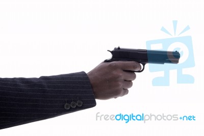 Hand Of Man With Gun On A White Background Stock Photo