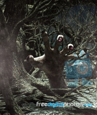 Hand Of Monster Rising From The Ground In Haunted Forest Stock Image