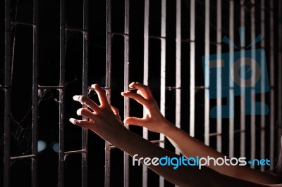 Hand Of Prisoner In Jail Stock Photo