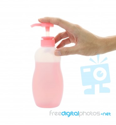 Hand Press Bottle Pump On White Background Stock Photo