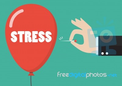 Hand Pushing Needle To Pop The Stress Balloon Stock Image