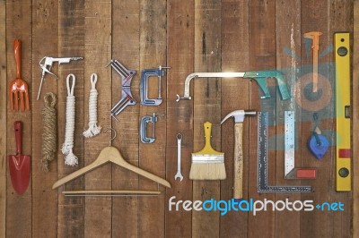 Hand Tools And Equipments Hang On Vertical Stripe Wood Board Stock Photo Hand Tools And Equipments Hang On Vertical Stripe Wood Board Stock Photo