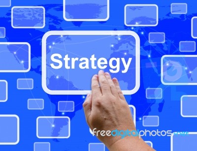 Hand Touching Strategy Button Stock Photo