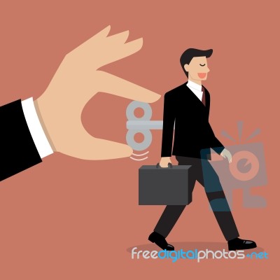 Hand Turns On Businessman With Wind-up Key In His Back Stock Image