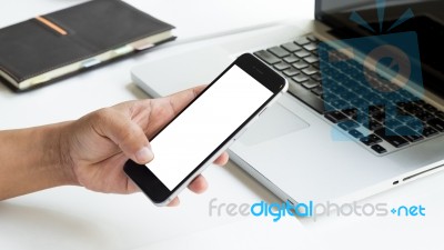 Hand Use Phone Blank Screen Top View In Office Morning Light Stock Photo