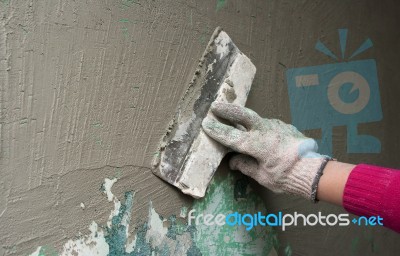 Hand With A Trowel Plaster Wall Stock Photo