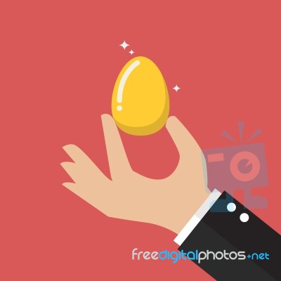Hand With Golden Egg Stock Image