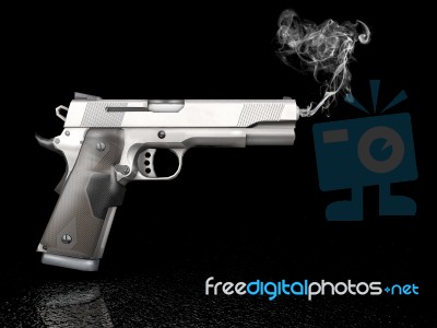 Handgun With Smoke Stock Image
