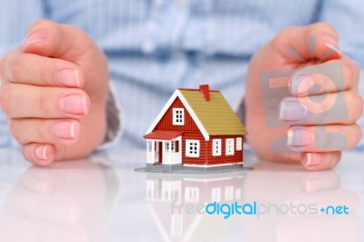 Hands And House Stock Photo