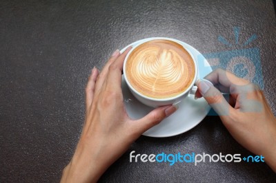 Hands Holding Coffee Cup Stock Photo