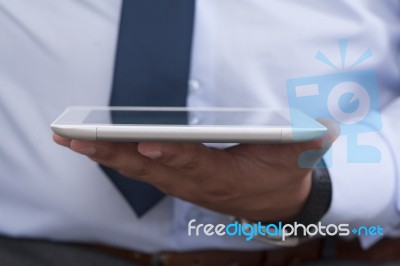 Hands Holding Digital Tablet Stock Photo