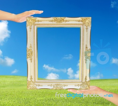 Hands Holding Frame Stock Photo