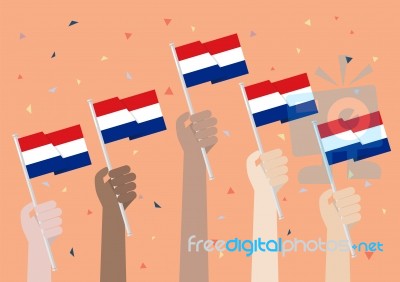 Hands Holding Up Netherlands Flags Stock Image