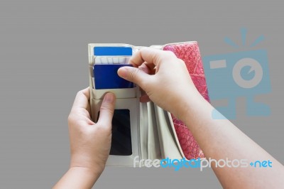 Hands Pull Credit Or Debit Card Out Of Wallet Stock Photo
