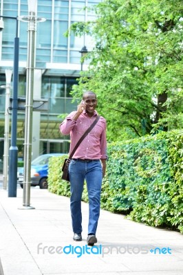 Handsome African Man On A Phone Stock Photo