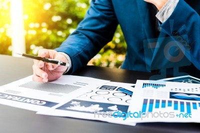 Handsome Businessman Wearing Suit And Using Modern Laptop Outdoo… Stock Photo