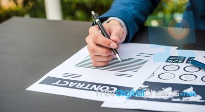 Handsome Businessman Wearing Suit And Using Modern Laptop Outdoo… Stock Photo