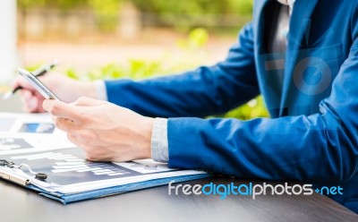 Handsome Businessman Wearing Suit And Using Modern Laptop Outdoo… Stock Photo Handsome Businessman Wearing Suit And Using Modern Laptop Outdoo… Stock Photo