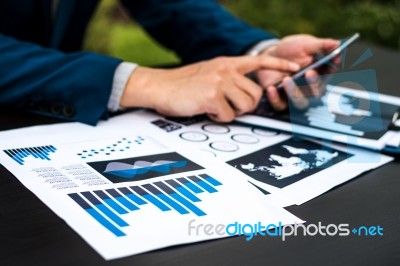 Handsome Businessman Wearing Suit And Using Modern Laptop Outdoo… Stock Photo