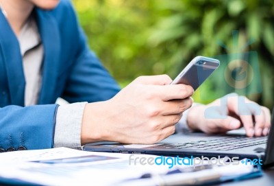 Handsome Businessman Wearing Suit And Using Modern Laptop Outdoo… Stock Photo