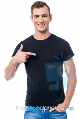 Handsome Casual Man Pointing Stock Photo