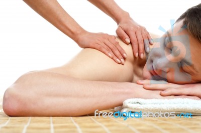 Handsome Male Getting Spa Massage Stock Photo