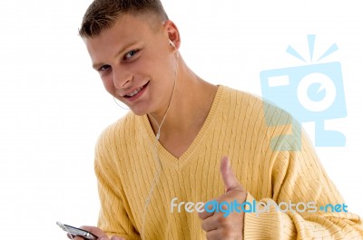 Handsome Male Showing Good Luck Sign Stock Photo