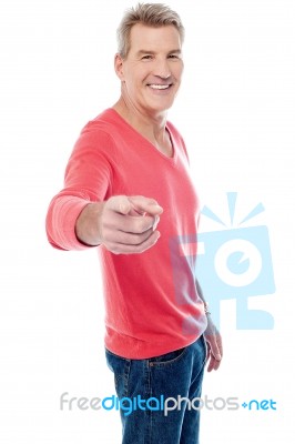 Handsome Man Pointing Towards Camera Stock Photo