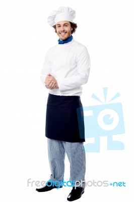 Handsome Young Cook Posing In Uniform Stock Photo