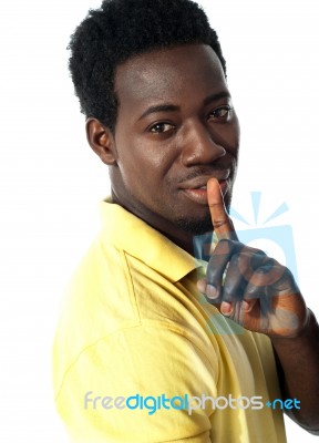 Handsome Young Guy Gesturing Silence Stock Photo