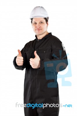 Handyman Wearing Uniform And Hardhat Stock Photo